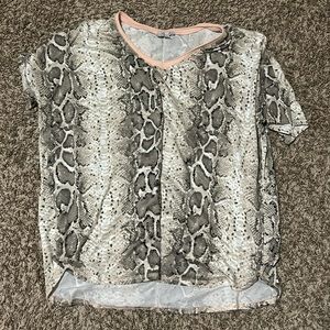 white birch snakeskin shirt with light pink neckline.